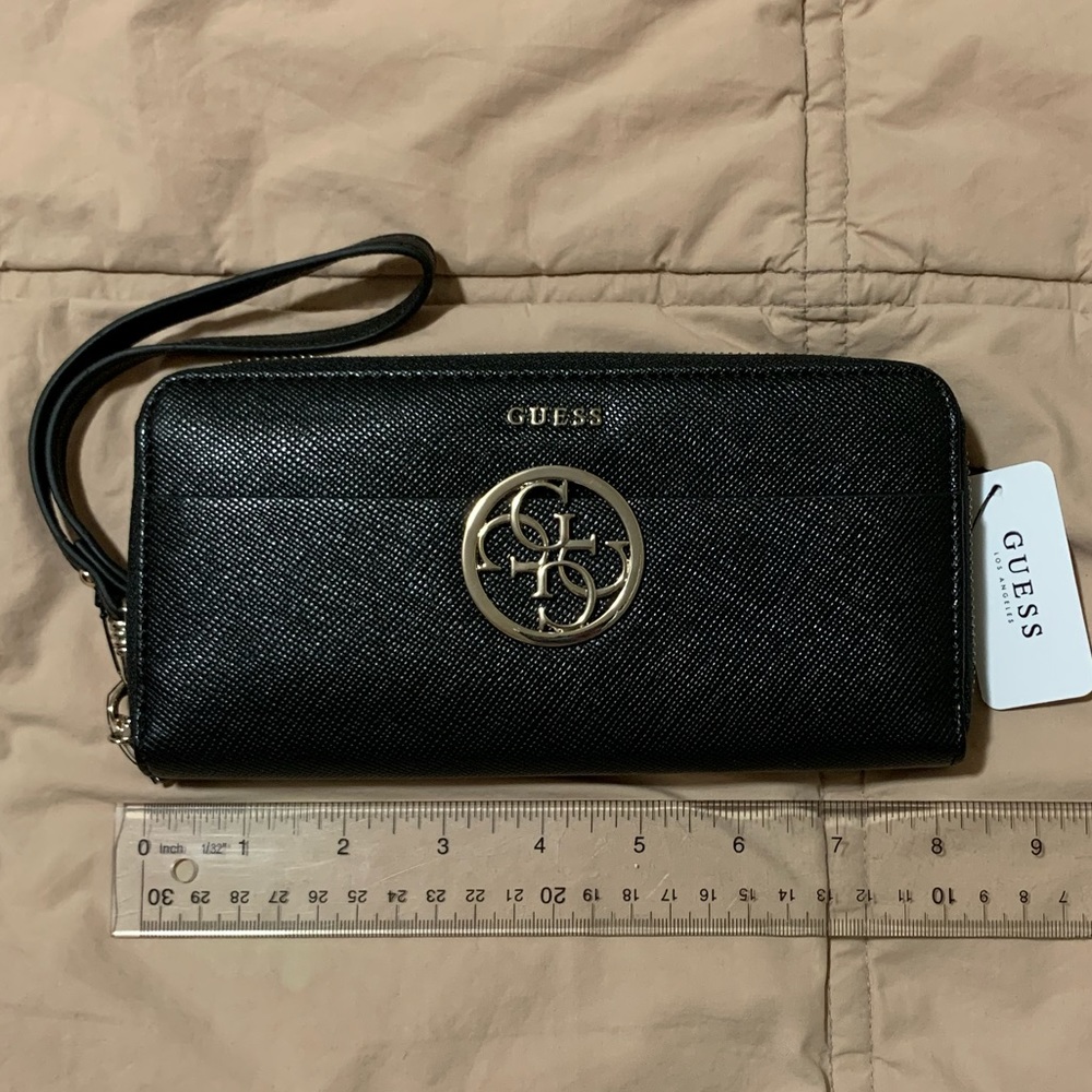 Guess. Brand new. Wallet/wristlet. Black
